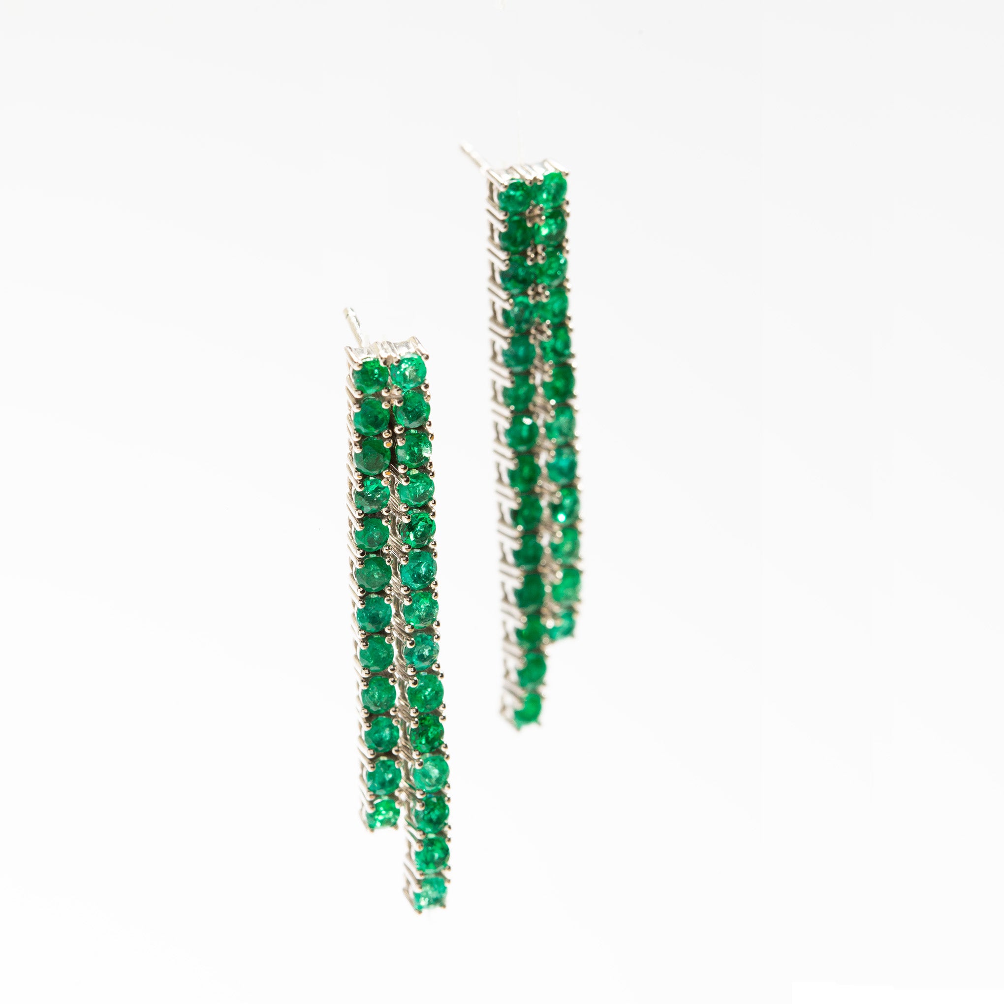 Smeralco's iconic Colombian emerald and diamond earrings, luxury jewelry with exquisite brilliance and timeless elegance by legendary Italian artisans